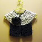 Short sleeve wool cardigan ..